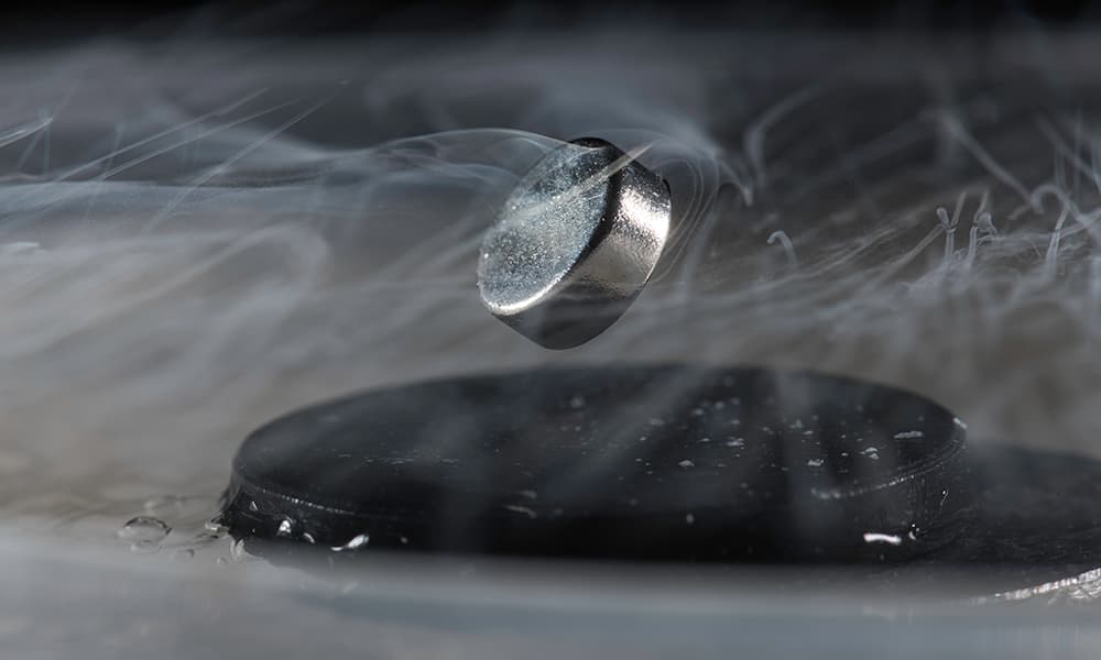 A magnet floating above a superconductor.