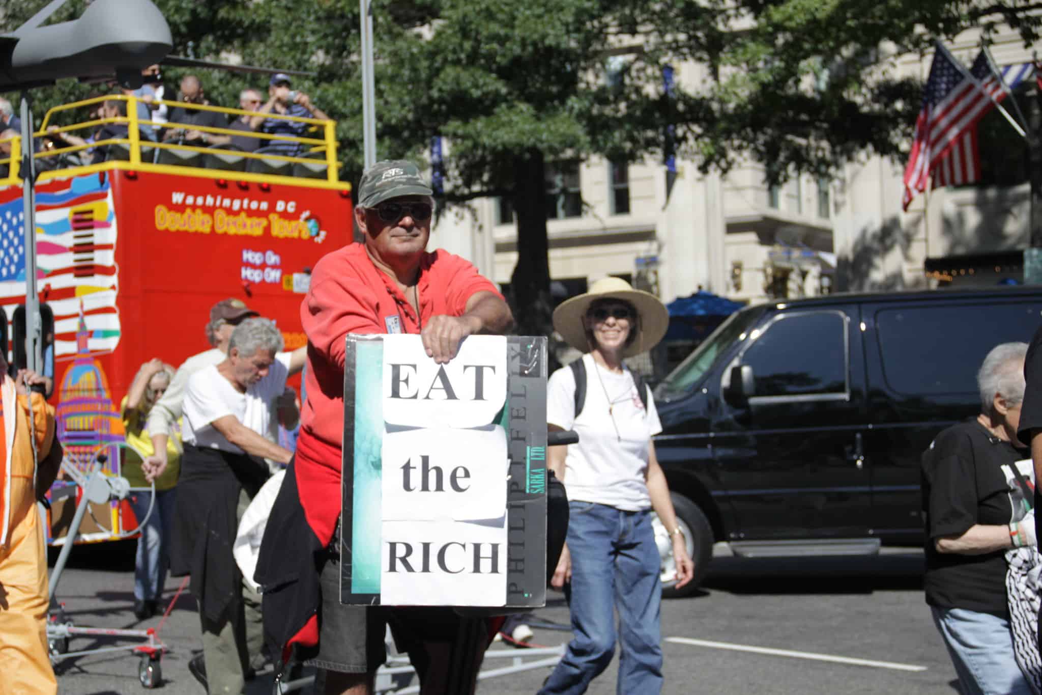 'eat the rich' sign (image: meesh via Flickr)